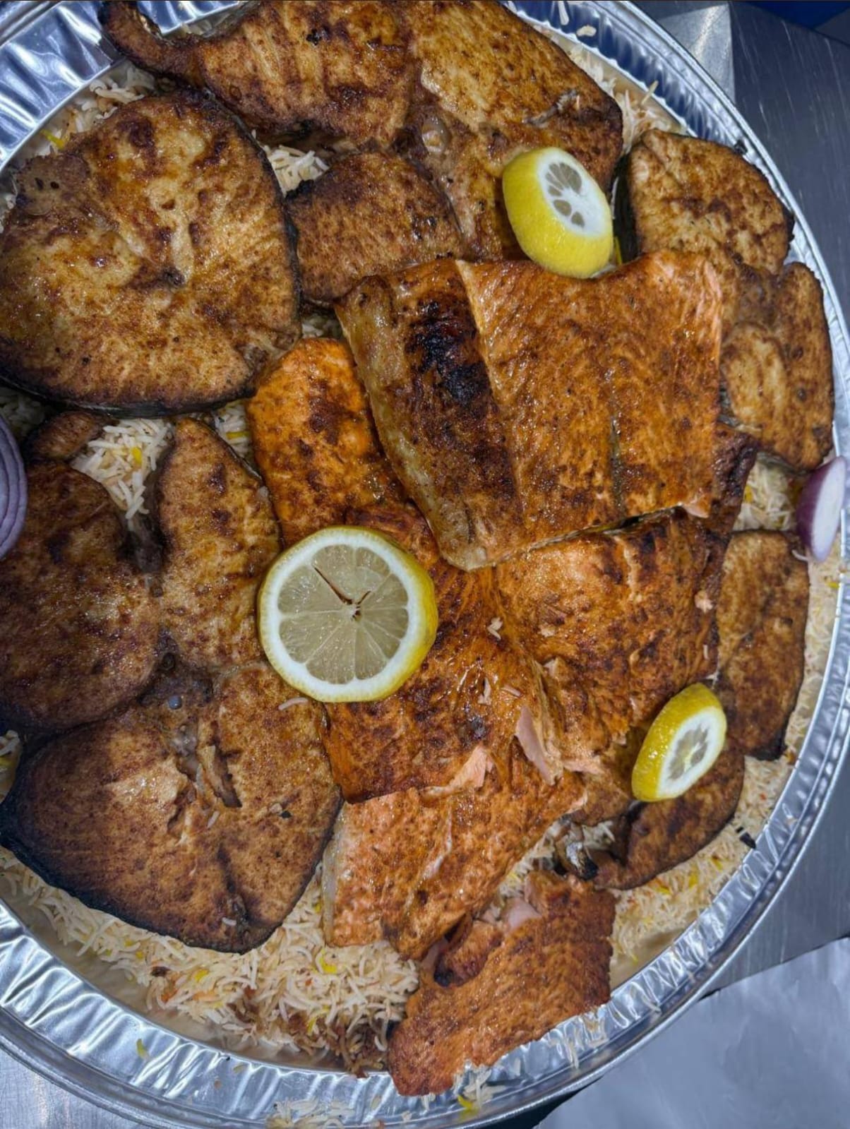 Rice platter with grilled seafood